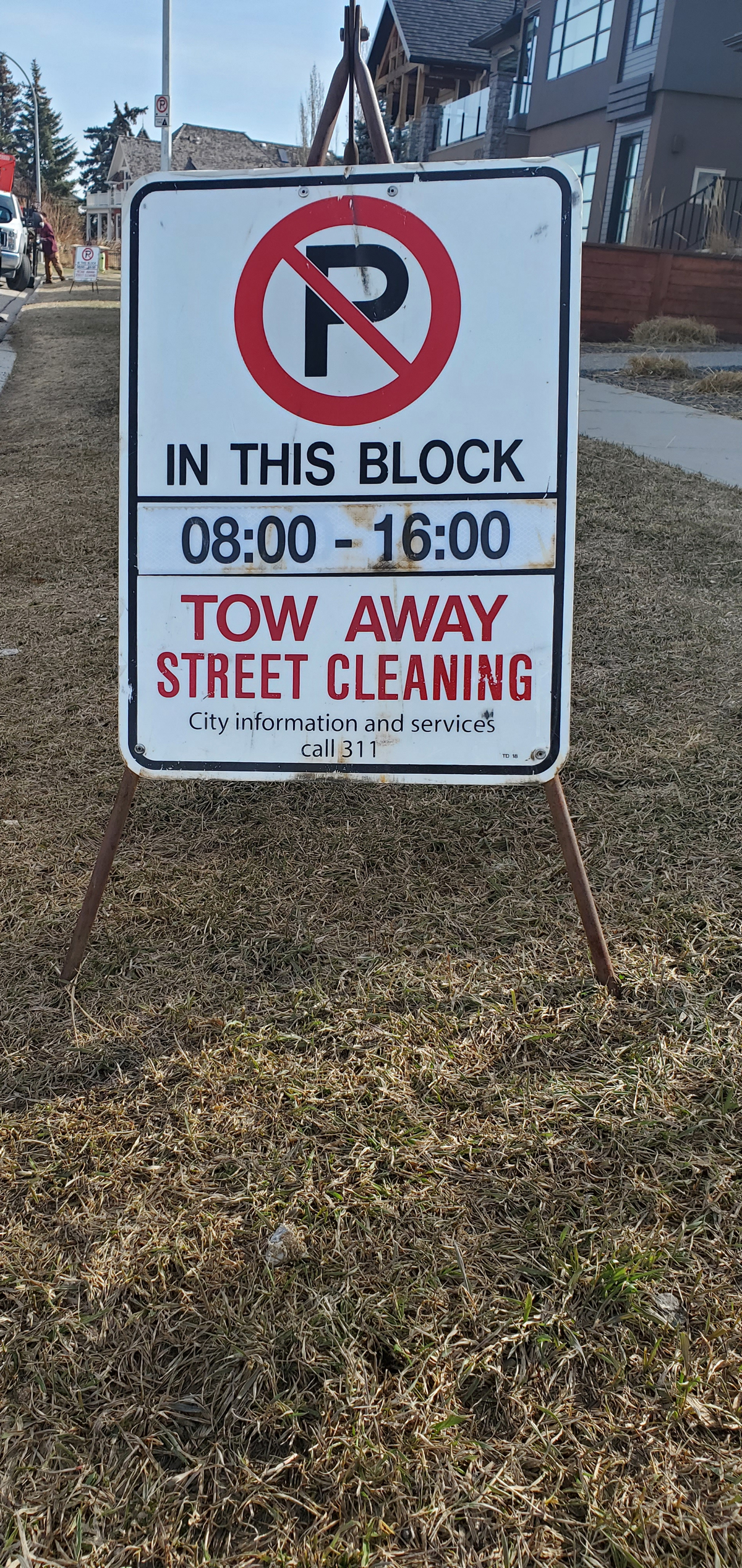 street-sweeping-sign